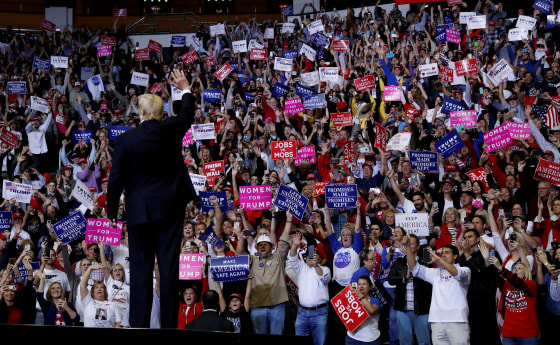 President Trump greets the crowd at a campaign rally in Houston