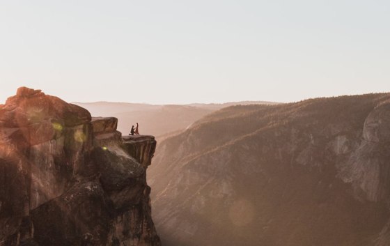 Proposal moment captured from a distance in Yosemite Park