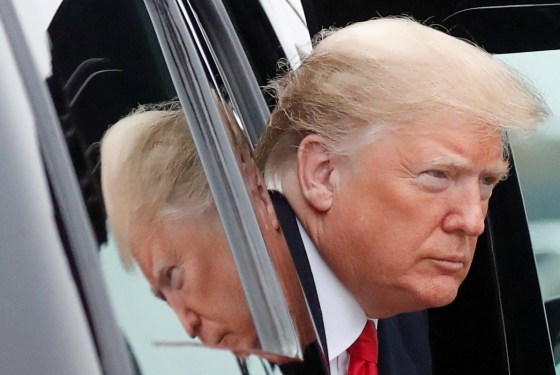 Image: U.S. President Trump exits presidential limousine before departing Washington on campaign trip from Joint Base Andrews in Maryland