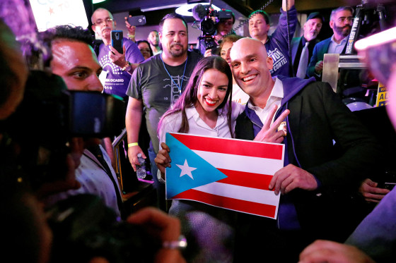 Image: Democratic congressional candidate Alexandria Ocasio-Cortez greets supporters at her midterm election night party in New York City