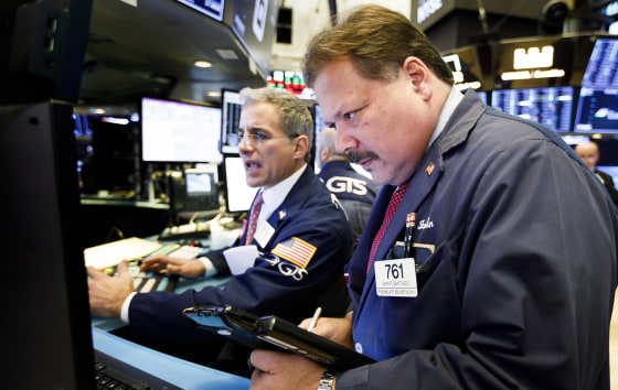 Traders work on the floor of the New York Stock Exchange on Nov. 12, 2018.