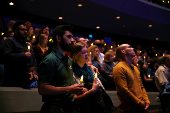 Mourners attend a vigil for families of victims of a mass shooting in Thousand Oaks, California