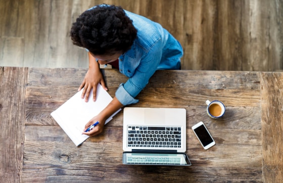 Image: Overhead view of a woman using a computer