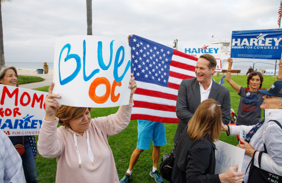 Democrat Harley Rouda greets supporters at a rally in Laguna Beach, California, on Nov. 6, 2018.