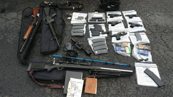 Authorities found several weapons and magazines of ammunition when they arrested Matthew Smith in Springfield, Kentucky, on Nov. 19, 2018.