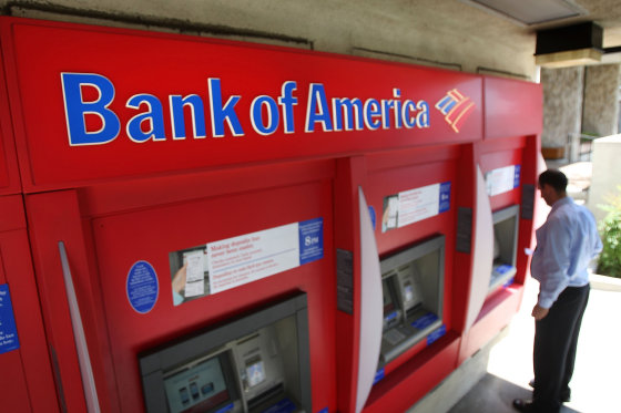 A man uses an ATM at a Bank of America branch in Pasadena, California, in 2009.