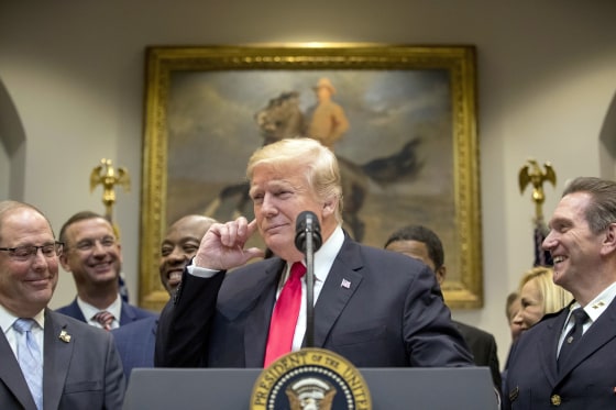 Image: President Donald Trump points to his ear and says \"Did I hear the word bipartisan?\" as he announces his support the First Step Act in the White House on Nov. 14, 2018.
