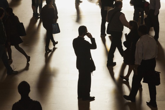 Image: A man stands in Grand Central Terminal as he speaks on a cell phone in New York in 2013.