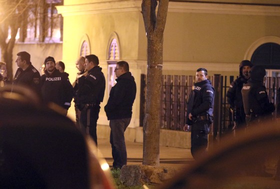 Image: Police stand outside a church after an attack in Vienna, Austria, on Dec. 27, 2018.