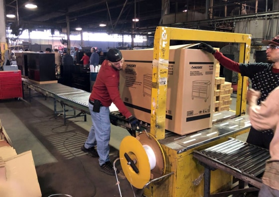 Image: Employees seen working inside the Metal Box International toolbox factory in Franklin Park