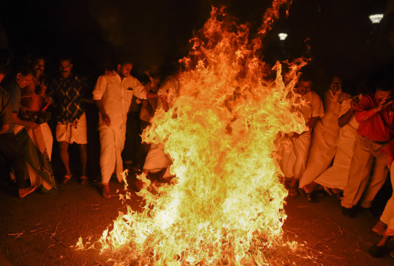 Image: Activists burn an effigy of Chief Minister Pinarayi Vijayan after reports that two women entered the Sabarimala Temple in Karala, India, on Jan. 2, 2019.