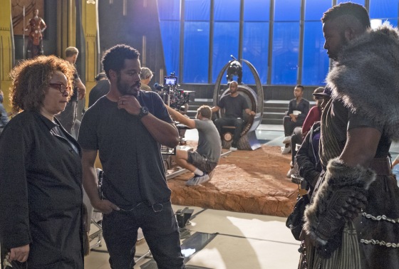 Costume Designer Ruth Carter and Director Ryan Coogler on the set of Marvel Studios' \"Black Panther\" with Winston Duke (M'Baku).