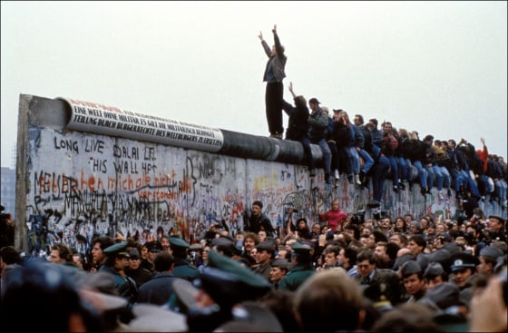Image: Celebrations on the Berlin Wall after the government announced people could cross the border freely in Germany on Nov. 12, 1989.