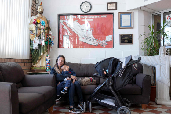 Image: Soredy, from Venezuela, holds her son, Santiago, inside a reception area of Casa del Migrante in Ciudad Juarez, Mexico, on Nov. 18, 2018.