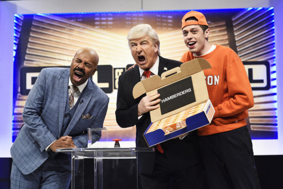 Kenan Thompson as Steve Harvey, Alec Baldwin as Donald Trump, and Pete Davidson as a Clemson student on SNL's \"Deal or No Deal Cold Open\" sketch