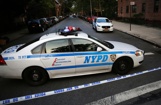 Image: The NYPD investigates the scene of a shooting in Gowanus, Brooklyn, on June 10, 2015.