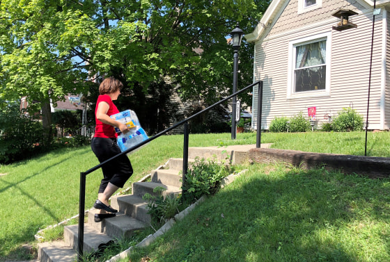 Cincinnati DoorDash worker Renee Shell delivers an order from Walmart in Cincinnati