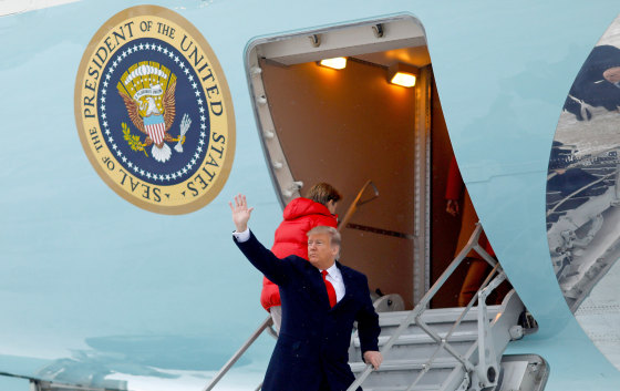 Image: U.S. President Donald Trump waves as he boards Air Force One as he departs for West Palm Beach, Florida, from Joint Base Andrews, Maryland