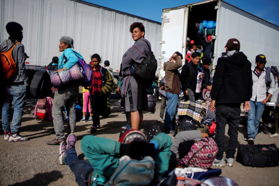 Image: Migrants rest beside a highway during their journey to the United States in San Jose Iturbide, Mexico, on Feb. 1, 2019.
