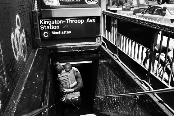 Image: A couple embrace at s subway station in Bedford-Stuyvesant, Brooklyn, on May 16, 2013.