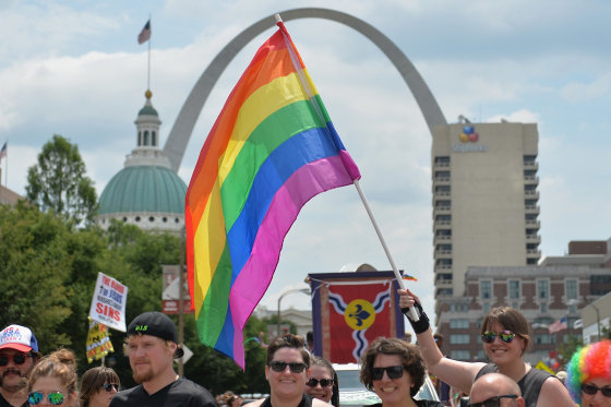 A participant waves a rainbow colored flag during the annual PrideFest parade in St. Louis, Missouri on June 28, 2015. The US Supreme Court made same-sex marriage legal throughout the nation Friday in a much-awaited landmark decision that triggered wild jubilation and tears of joy across the country. AFP PHOTO/ MICHAEL B. THOMAS (Photo credit should read Michael B. Thomas/AFP/Getty Images)