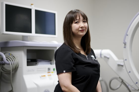 Image: Dr. Emily Goulet, a reproductive endocrinology and infertility specialist, in her office in Dallas on Feb. 8, 2019