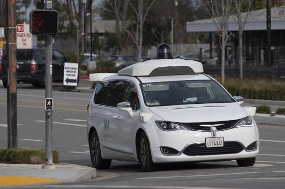 Image: A Waymo self-driving test vehicle on the road in Mountain View, California