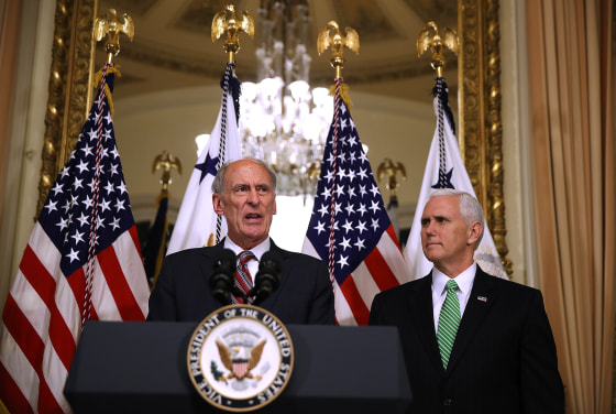 Image: Mike Pence Swears In Dan Coats As Director Of National Intelligence