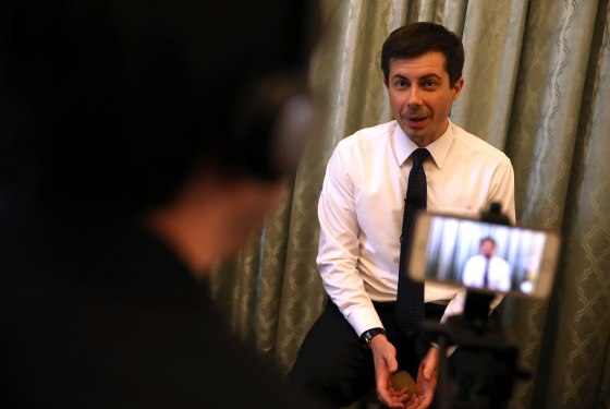 Image: Democratic presidential hopeful South Bend, Indiana mayor Pete Buttigieg speaks to members of the media before appearing at the Commonwealth Club of California