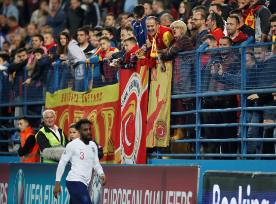 Image: Montenegro fans and England's Danny Rose during the match at Podgorica City Stadium, Podgorica, Montenegro