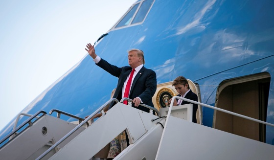 Image: U.S. President Donald Trump and U.S. first lady Melania Trump arrive aboard Air Force One