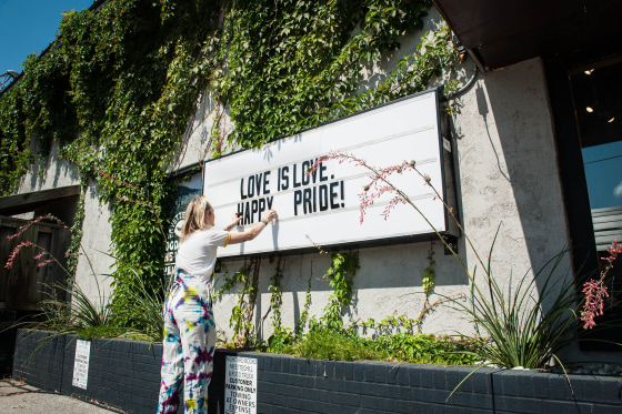 A \"Love is Love, Happy Pride sign\" at 2018 Pride in Fayetteville, Arkansas