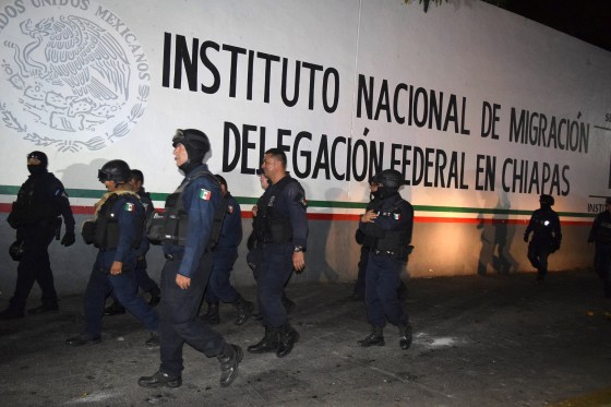 Image: Policemen outside the Siglo XXI immigrant detention center in Tapachula