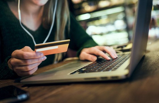 Image: Photo of a young woman shopping online