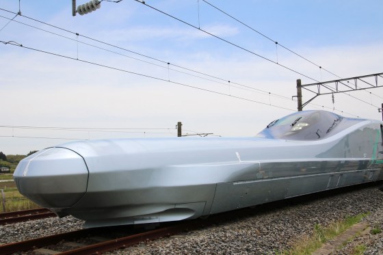 Image: A prototype of Japan's next-generation Shinkansen bullet train, set to be the fastest train on wheels when it enters service, reached speeds of 320 kilometres (198 miles) per hour on a test run on May 16