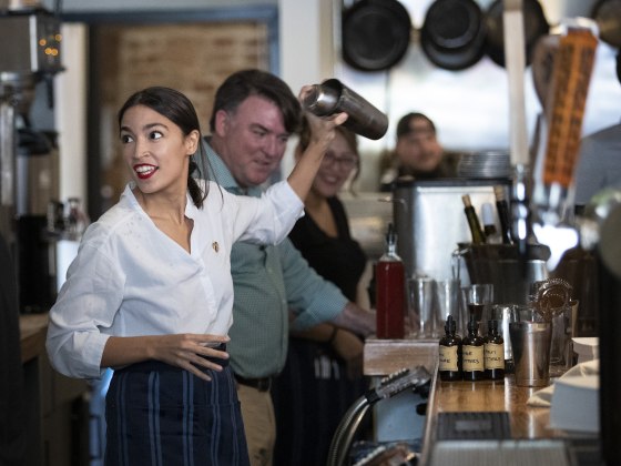 Image: Rep. Alexandria Ocasio-Cortez Bartends In Support Of Raise the Wage Act