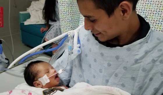 Marlen Ochoa-Lopez's husband in the hospital with Yadiel.