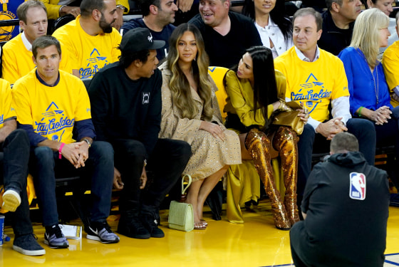 Image: Jay-Z and Beyonce sit next to Nicole Curran at the NBA Finals Game between the Golden State Warriors and Toronto Raptors in Oakland, California, on June 5, 2019.