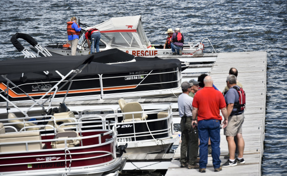 Image: Search and rescue teams stage near Cemetery Island on Canyon Ferry Lake as they search for a missing diver on June 17, 2019.