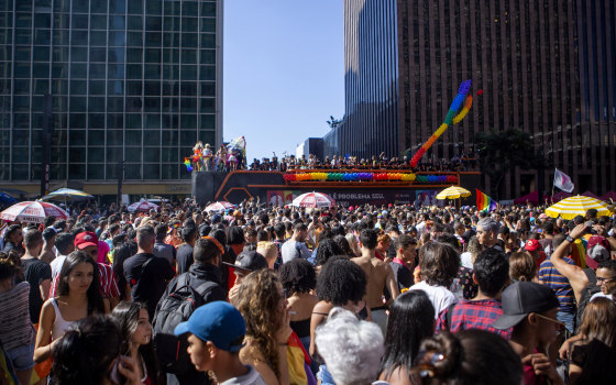 Image: People attend the Sao Paulo Pride Parade in Brazil on June 23, 2019.