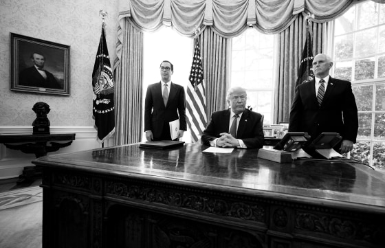Image: President Donald Trump, Vice President Mike Pence and Treasury Secretary Steve Mnuchin in the Oval Office before signing sanctions against Iran's Supreme Leader on June 24, 2019.