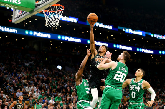 Image: Boston Celtics defenders try to block a shot from Giannis Antetokounmpo, of the Milwaukee Bucks, at TD Garden in Boston on Dec. 21, 2018.