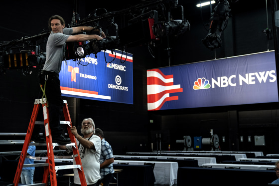 Image: Workers assemble the set before the Democratic presidential primary debates in Miami, Florida, on June 25, 2019.