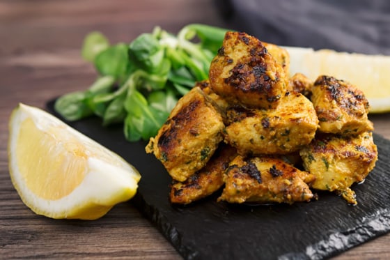 These Indian Chicken Tikka Bites use a marinade of yogurt, garlic, ginger and spices to tenderize and flavor the meat.