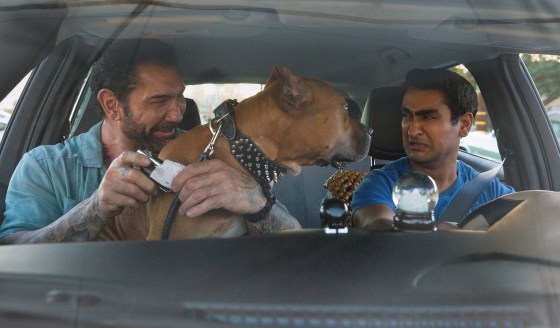 Dave Bautista as Vic, Pico the Pibble, and Kumail Nanjiani as Stu in \"Stuber.\"