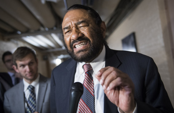 Rep. Al Green, D-Texas, talks with reporters after a meeting of House Democrats at the Capitol