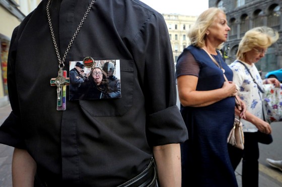 Image: A supporter of LGBT community attends a rally after a murder of Elena Grigoryeva, activist for LGBT rights, in Saint Petersburg
