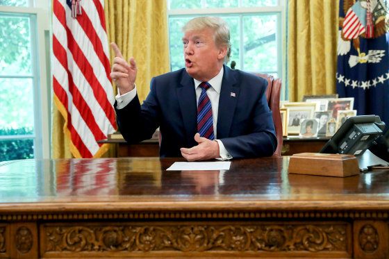 Image: U.S. President Trump speaks to the news media in the Oval Office at the White House in Washington