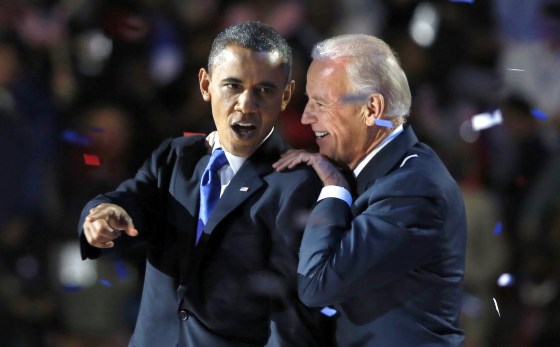 Image: U.S. President Barack Obama gestures with Vice President Joe Biden after his election night victory speech in Chicago