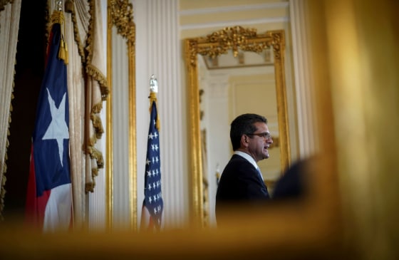 Image: Pedro Pierluisi speaks at a press conference after being sworn in as Governor of Puerto Rico in San Juan on Aug. 2, 2019.